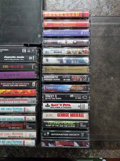 Cool collection of vintage cassette tapes. Got a bunch of classic artists from the 80s and 90s. Rock...