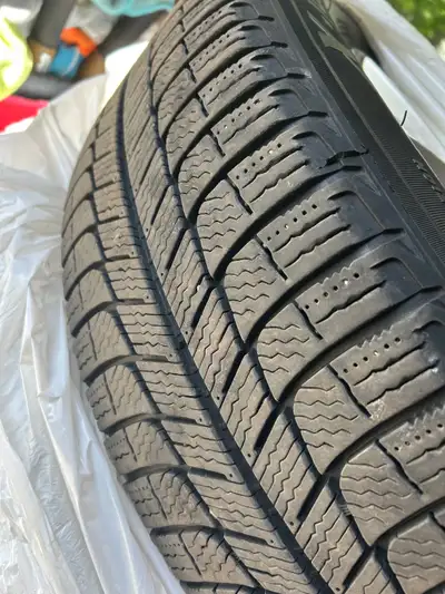 Winter Tires a set of four rally wheels with Michelin X Ice tires. Size is 215/60 R16