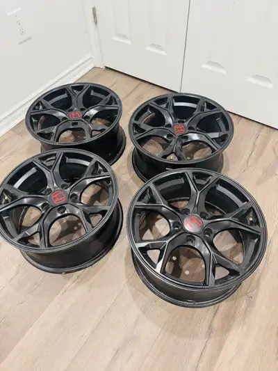 Set of 4 OEM Honda alloy rims — matte black with red Honda center caps. • Size: 17×7.5J • Bolt patte...