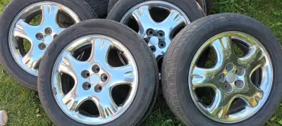 Set of chrome wheels rims and tires 205 55 r16 bolt pattern 5x100 - 5x4 rims are in great shape tire...