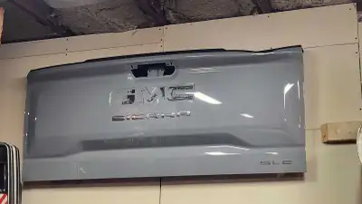 Tailgate pickup acton dent on top Other than dent, like new