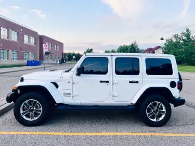 For sale is my 2021 Jeep Wrangler Unlimited in white, with 68,000 km. This Wrangler is in excellent...