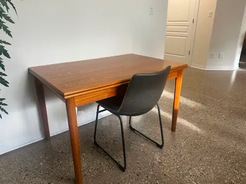 Danish modern extending teak dining table manufactured by BRDR Furbo in Denmark, circa 1950s. This v...