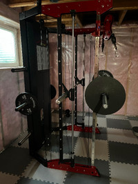 Cable machine with bars, bench, and weights