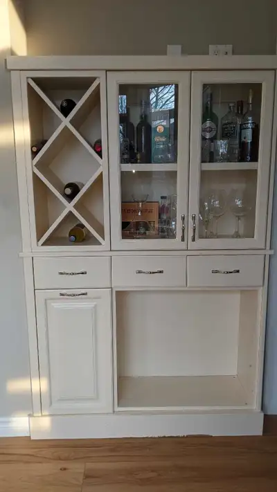 Kitchen cabinets and countertops for sale, as well as a liquor cabinet. Please contact for more spec...