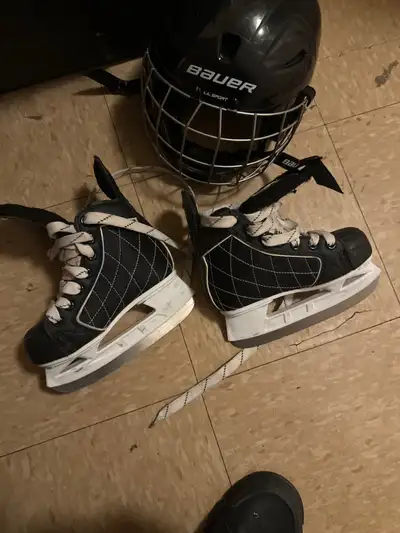 Boys hockey, skates,and helmet, View more