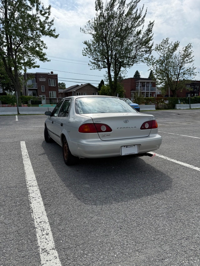 Toyota Corolla CE 2002 — photo 2