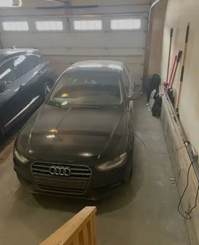 Selling 2013 black Audi A4 with less than 77,000 kilometers, accident-free, and clean title, featuri...