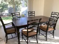 Elegant dining room table and six chairs