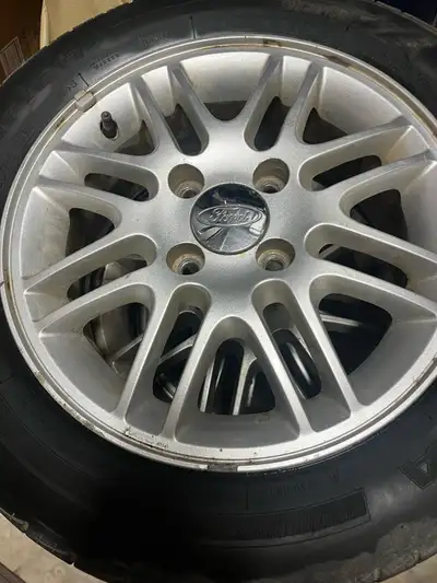 Tires from a Ford Focus Tires are in ok condition but rims are in good condition $200 OBO