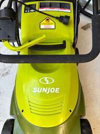 Sunjoe grass mower barely used $150, 