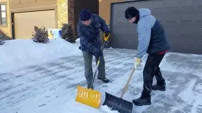 Snow shovelers needed, View more