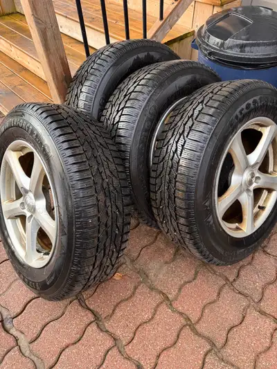 235/65R17 Firestone winterforce 2 UV On Alloy Rims used for only 1 season on a 2013 Ford Edge