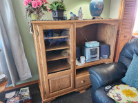 Solid oak entertainment unit. Mennonite made. Like new. 