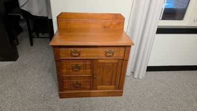 Antique Wash Stand with closed {solid} top and decorative back board c 1870. Refinished and replacem...