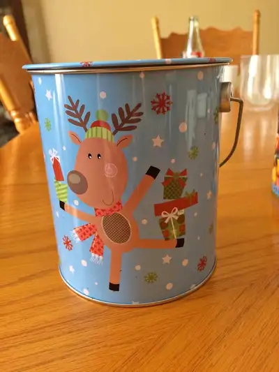 Brand New Christmas Tin-$2 cash. Porch pick up Harmony/Adelaide, View more