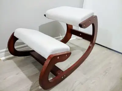 Ergonomic rocking chair with padded surface, View more