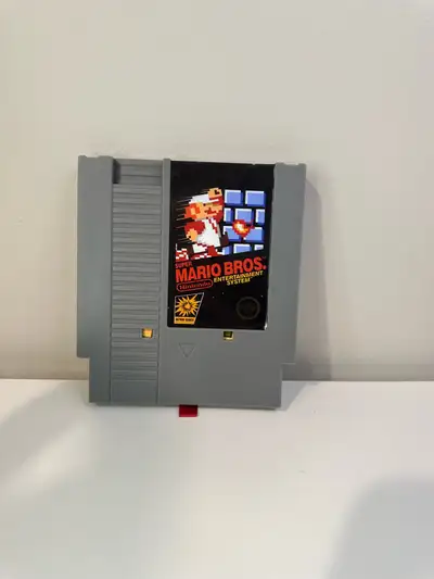 Super Mario Bros. NES Game Cartridge like with Pixel Art Figure, View more