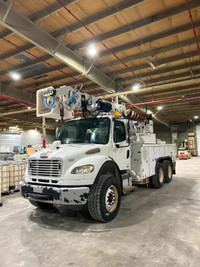 2009 Freightliner with Altec DM47 Digger Bucket Utility Unit