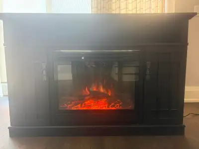 Electric Fireplace in Dark Colored Cabinet, View more