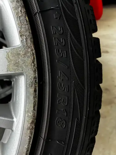 Selling a complete set of factory BMW 18-inch wheels from a 2013 BMW 328i, mounted with Winter Claw...