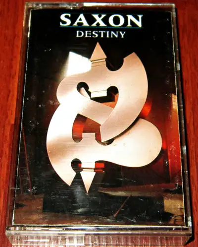 Cassette Tape :: Saxon – Destiny $18 Dollars A1 Ride Like The Wind A2 Where The Lightnings Strikes A...