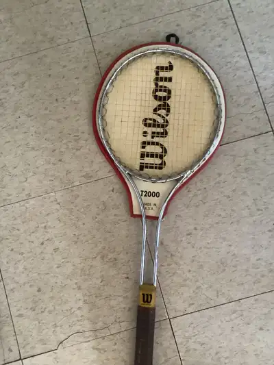Vintage Wilson Steel tennis racquet  T2000 with original cover, View more