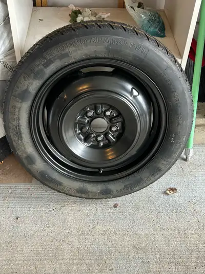 Spare tire for Toyota Matrix On rim.