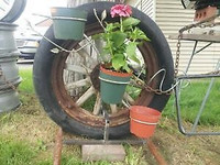 antique wooden spoked wheel custom built planter/Lawn art