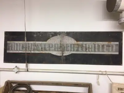 Original sign 51” x 14” Midwest Paper Limited was located at 1118 Broad Street in Regina. This sign...
