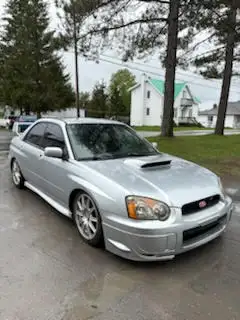 Francais: Opportunité rare pour passionné. Cette Subaru WRX STI 2004 est dans une condition remarqua...