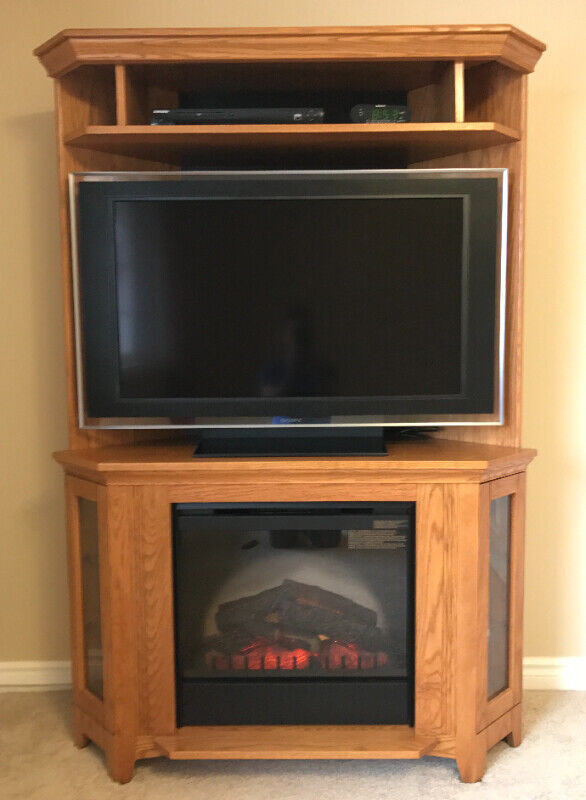 Buhler solid oak TV stand Dimplex with remote electric fireplace in Fireplace & Firewood in City of Toronto