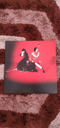 White Stripes' Elephant on red and black split and white vinyl. 