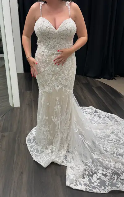 • Purchased this dress at 'Bliss Bridal Boutique' in Whitby on June 4, 2024. • Size: 18 • Pickup: Br...