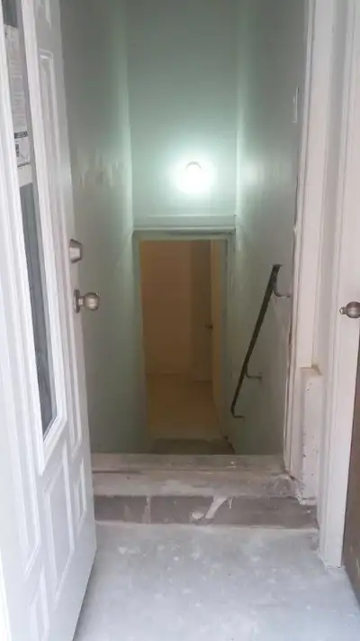 Furnished basement apartment with separate entrance, one bed room, kitchen and washroom, separate la...