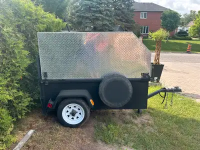 Scooter trailer for sale. Checker plate hood , powder counted ramp for easy loading solid little tra...