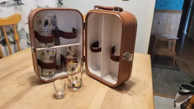 Vintage portable bar in leather travel case. Four gold embossed horse themed glasses, one shot glass...