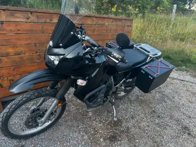 Excellent Condition Comes with 2 sets of tires Cover Larger sprocket for Highway Side bins Only 4300...