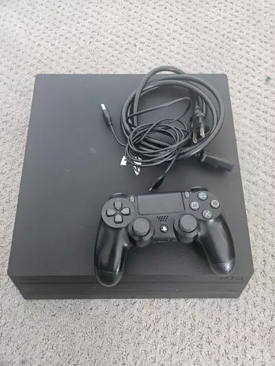 Ps4 pro 1tb with controller , View more