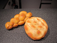 Artificial / fake/ display twist and sour dough round breads.