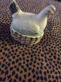 Tiny, antique pottery hen on nest, $5