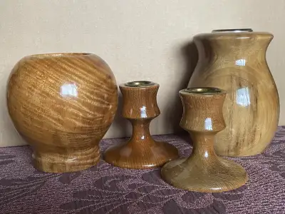 Here are three Myrtle Wood candle holders from Oregon, and one Ponderosa Pine, on the left side of t...