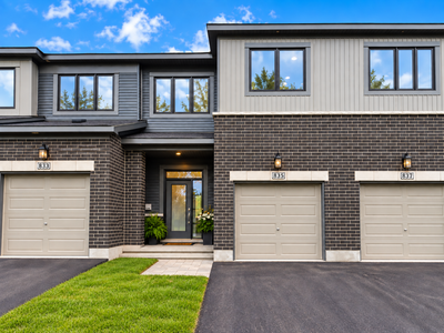 Absolutely stunning executive townhouse. Upgrades from top to bottom in this quality Minto build in...