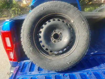 Set of 4 Hercules Avalanche directional snow tires...225/65R16...fits Ford Escape...used 1 winter......