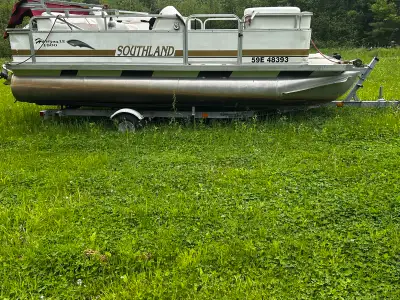 18 feet long, year 2003, 40 hp Johnson, new floor coating, new Bimini Top, new cover, with trailer.