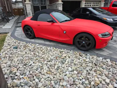 Selling my 2005 BMW Z4 2.5i Roadster, a beautiful red convertible with only 82,000 km. The car is in...
