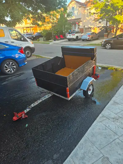 4ft by 6ft box with u-hooks bolted to frame. Total length with tongue is 8ft. $800 OBO -New flooring...