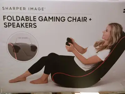 Sharper Image Folding gaming chair with built in speakers Brand new (Never used & still in box)