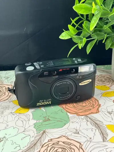 Samsung AF Slim Zoom 35mm Film Camera, View more