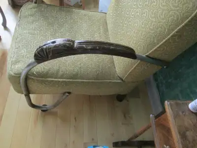 older chair in original condition, it needs to be reupholstered, there are no rips but the front edg...